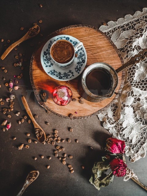 A Cup of Coffee on a Wooden Chopping Board