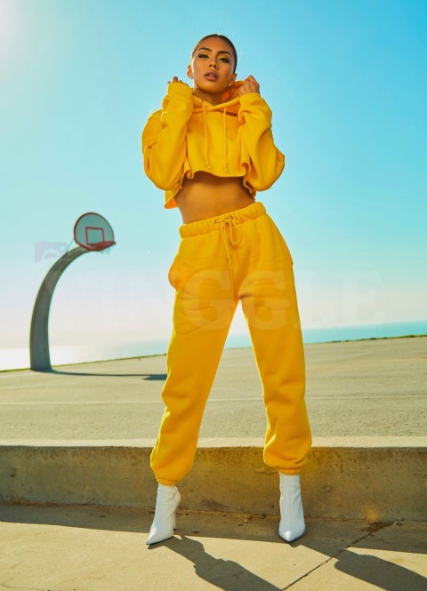 Women In Yellow Tracksuit