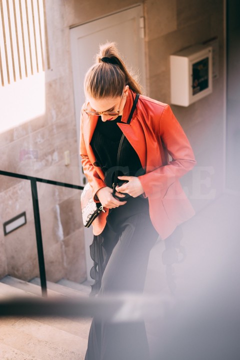 Women wearing orange Jacket